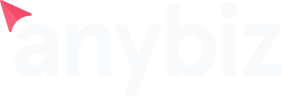 Logo with the text anybiz in white lowercase letters on a dark background. A small red triangular shape is positioned above the letter a.